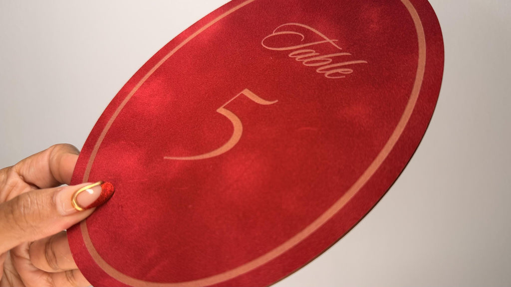 Velvet oval table numbers set for wedding reception